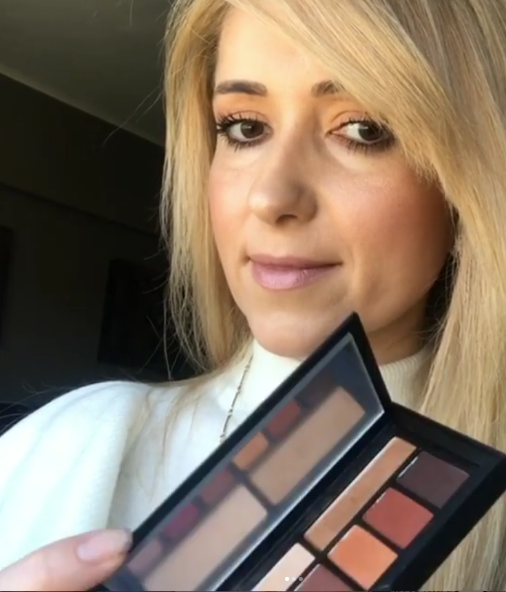 Marzena with a professional makeup palette